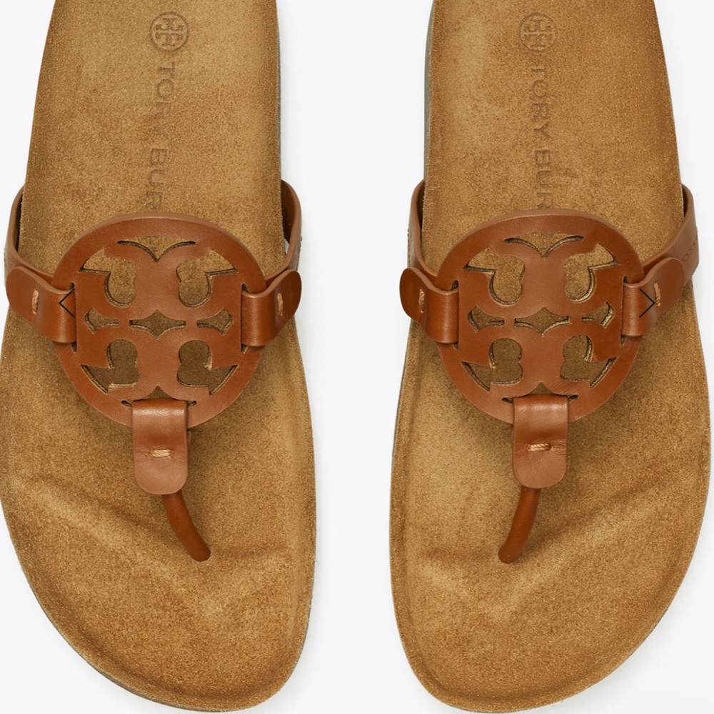 Tory Burch sandals never worn. Still in box not touched.
